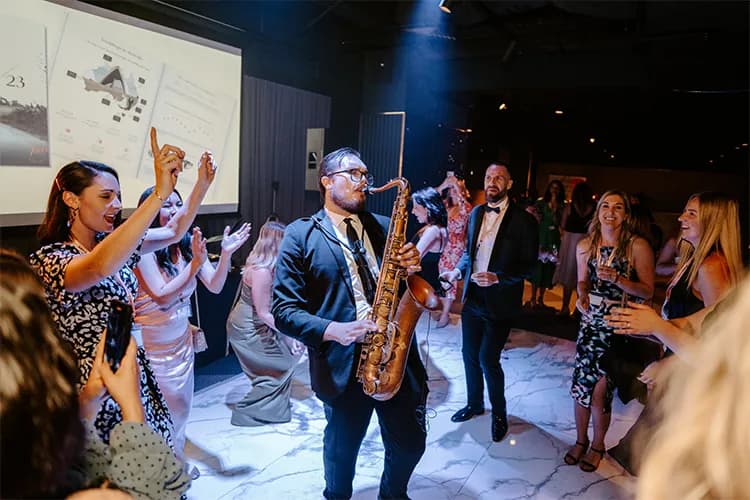 Michael playing saxophone